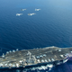 Illustration for article titled Navy Hornets Mock-Dogfight With Malaysian Flankers In South China Sea